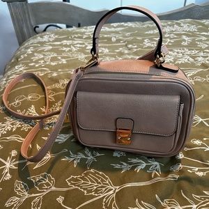 Small faux leather crossbody bag.